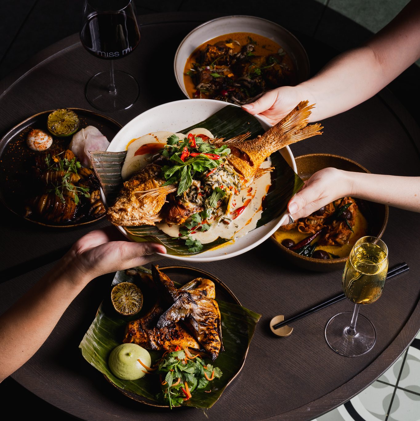 Whole Fried Market Fish with Coconut Braised Spiced Kale and other menu items
